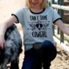 Cruel Girls Can't Tame A Cowgirl Tee -Equestrian Clothing Store cant tame cowgirl tee turquoise lifestyle CTT8510003 miller 81480.1651867403